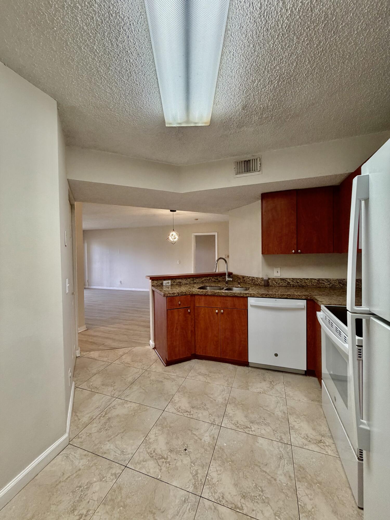 8781 Wiles Road, Unit 203 Coral Springs, FL 33067 - Photo 5 of 17 IMG_6782