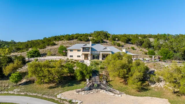 a view of a houses with a garden