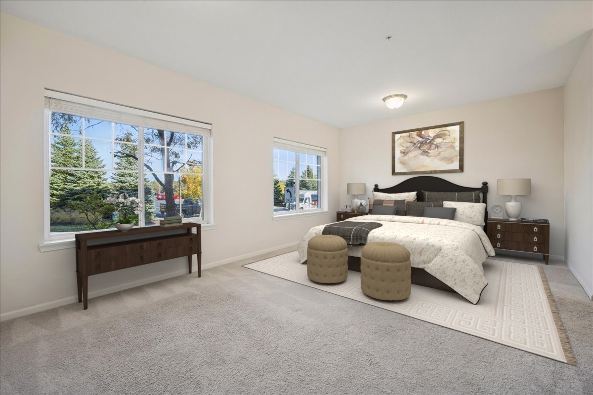2220 Founders Drive, Unit 119 Northbrook, IL 60062 - Photo 2 of 2 a bedroom with a bed and a large window