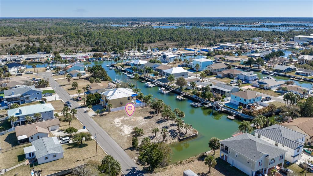 4348 Tahiti Drive Hernando Beach, FL 34607 - Photo 11 of 11 an aerial view of a city with lots of residential buildings