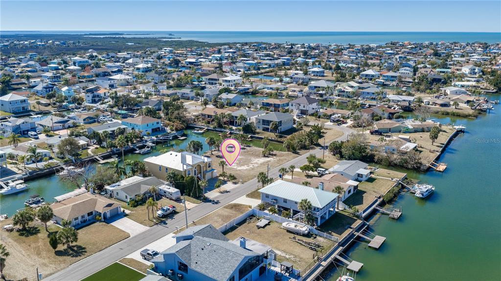 4348 Tahiti Drive Hernando Beach, FL 34607 - Photo 6 of 11 an aerial view of a city