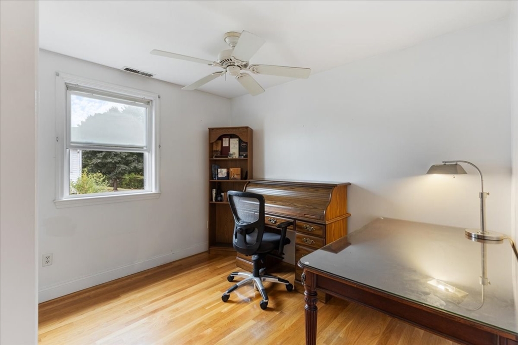 9 Georgia Drive Walpole, MA 02081 - Photo 17 of 42 a view of a workspace with furniture and a window
