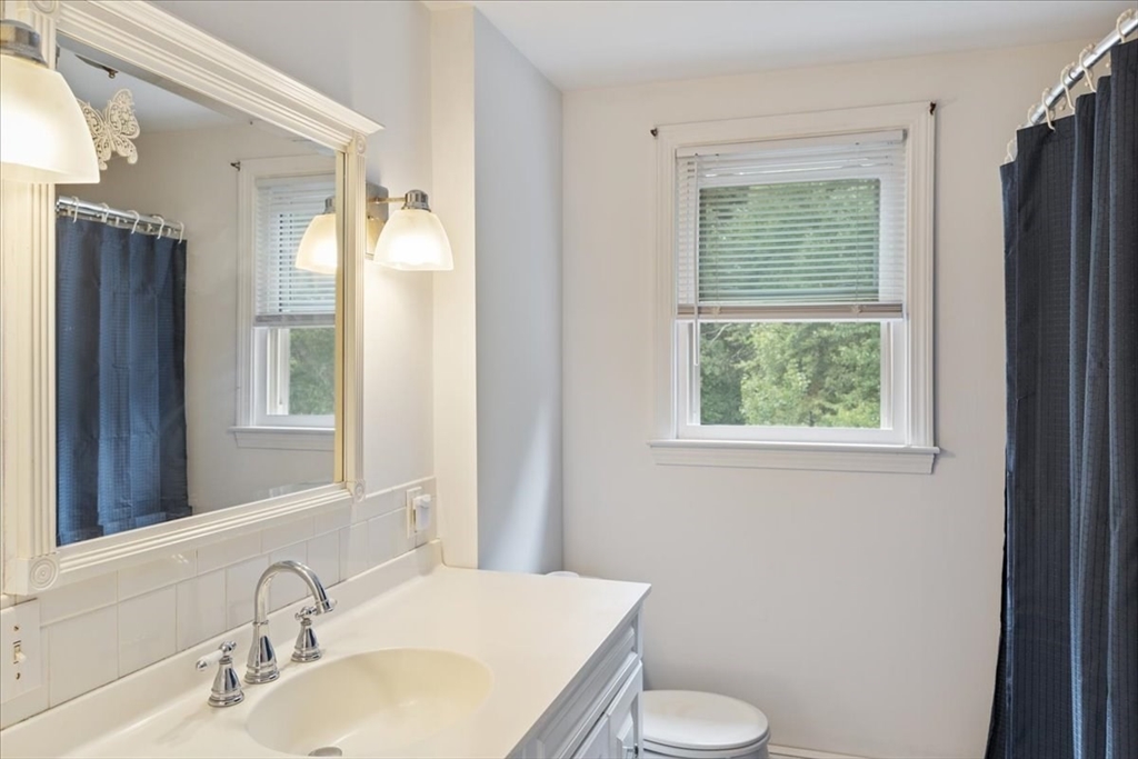 9 Georgia Drive Walpole, MA 02081 - Photo 23 of 42 a bathroom with a sink toilet and shower