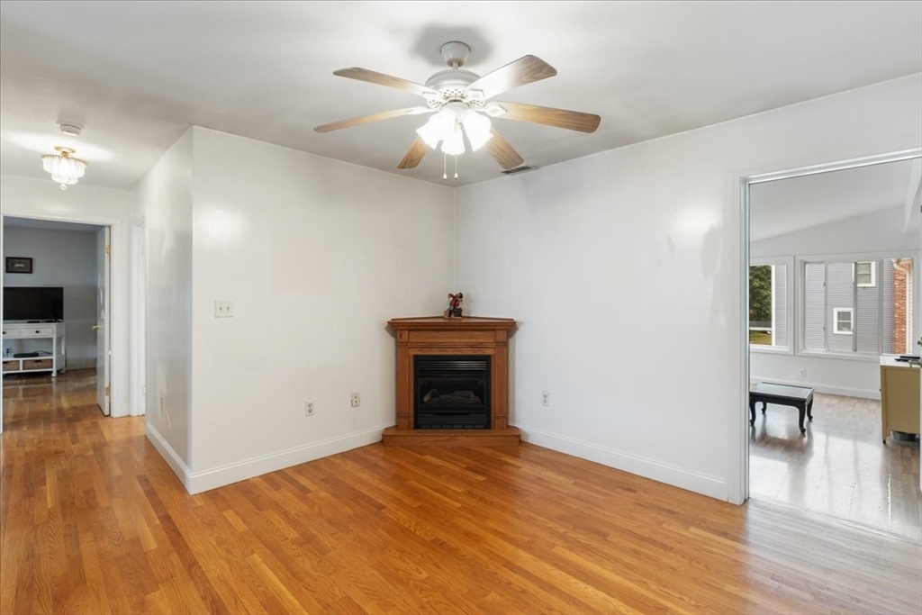 9 Georgia Drive Walpole, MA 02081 - Photo 27 of 42 a view of empty room with wooden floor