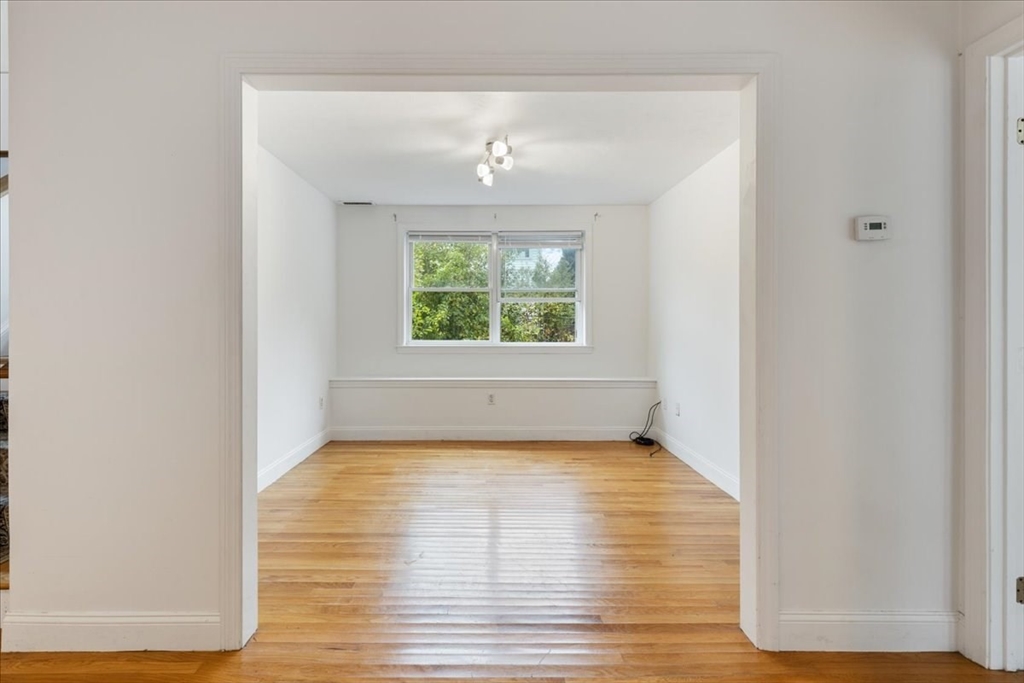 9 Georgia Drive Walpole, MA 02081 - Photo 32 of 42 a view of a room with wooden floor and window