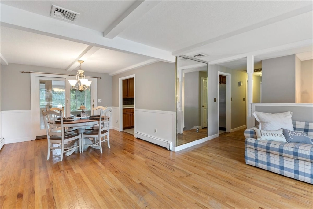 9 Georgia Drive Walpole, MA 02081 - Photo 10 of 42 a view of a dining room with furniture window and wooden floor