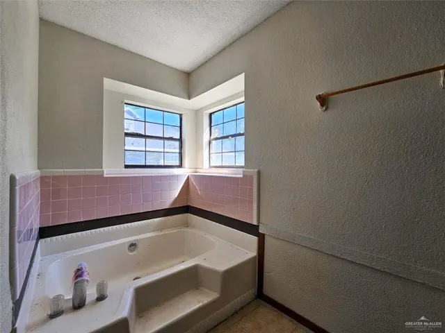 a bathroom with a sink and a bathtub