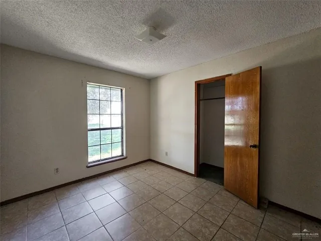 an empty room with closet
