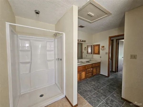 a room with a bed and a window