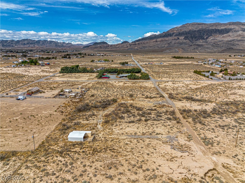 1411 West Harris Farm Road Pahrump, NV 89060 - Photo 11 of 25 Property view of mountains with a rural view and view of desert