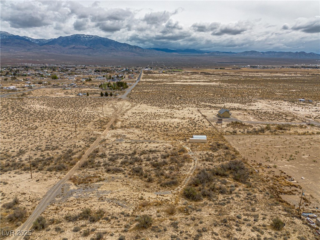 1411 West Harris Farm Road Pahrump, NV 89060 - Photo 7 of 25 Property view of mountains with a rural view and view of desert