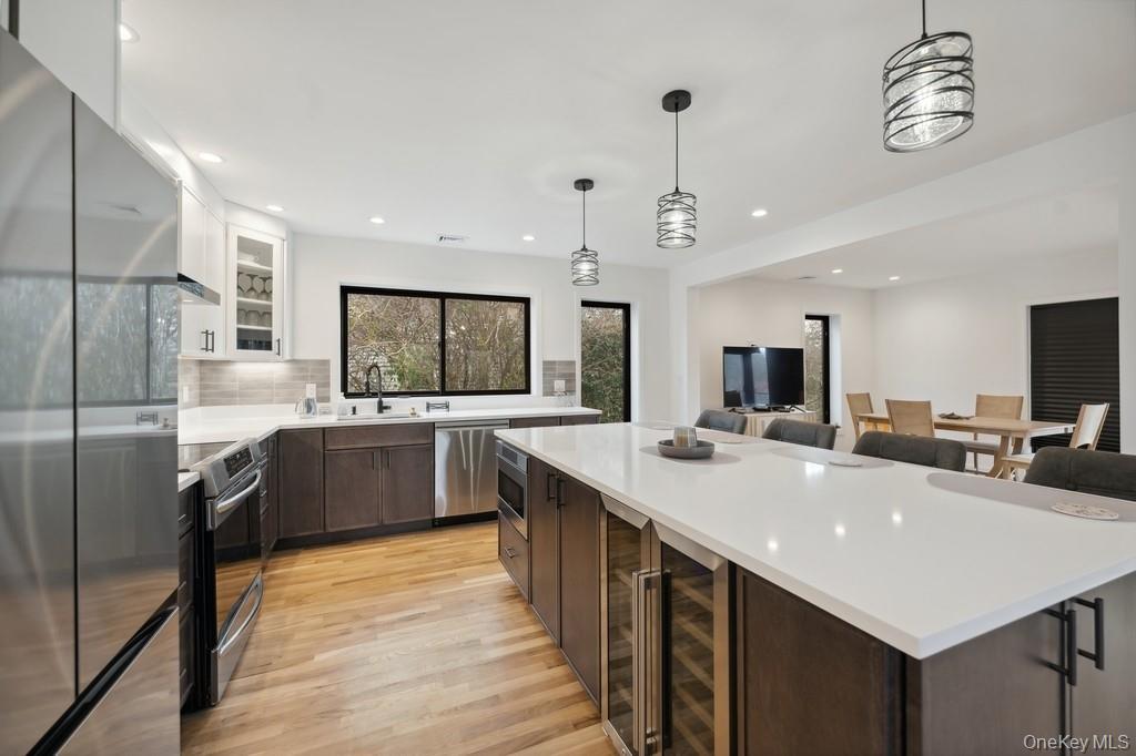 45 Ditch Plains Road Montauk, NY 11954 - Photo 6 of 19 a large kitchen with a center island and stainless steel appliances