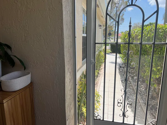 a kitchen with stainless steel appliances a stove and a microwave