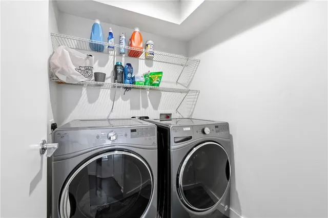 a utility room with dryer and washer