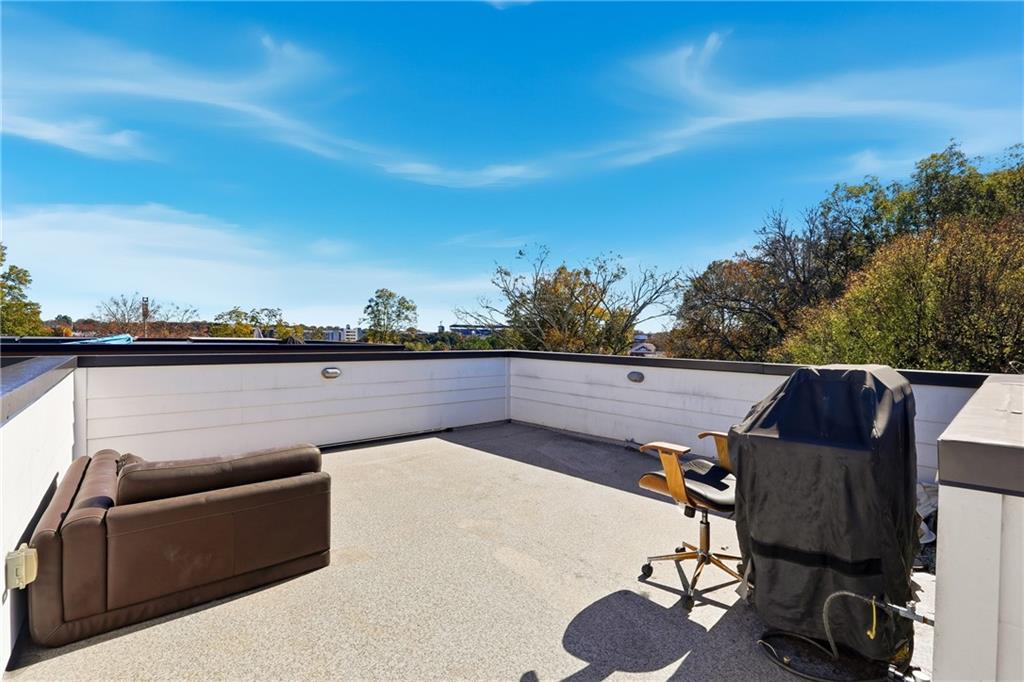 225 Crumley Street Southwest Atlanta, GA 30312 - Photo 20 of 23 a view of a couches in a patio