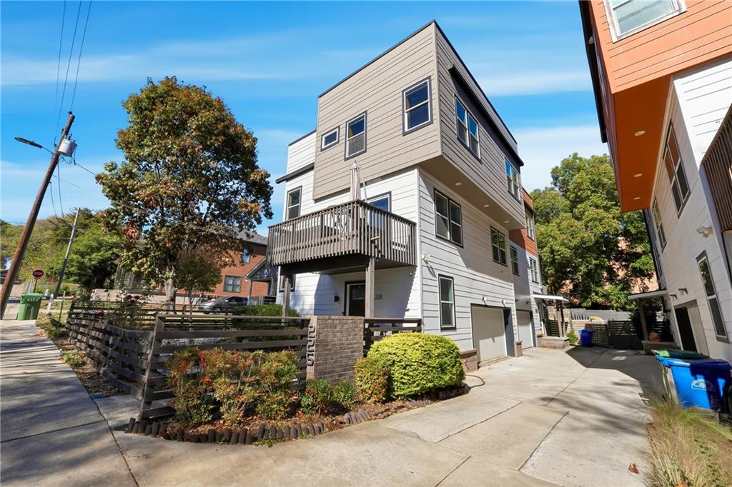 225 Crumley Street Southwest Atlanta, GA 30312 - Photo 2 of 23 a front view of a building with trees