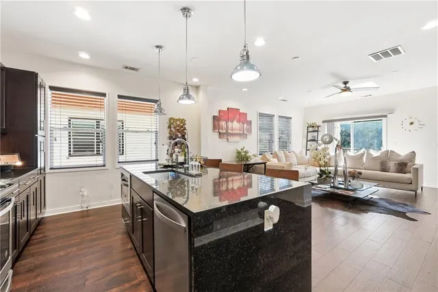 a kitchen island with granite countertop lots of counter top space