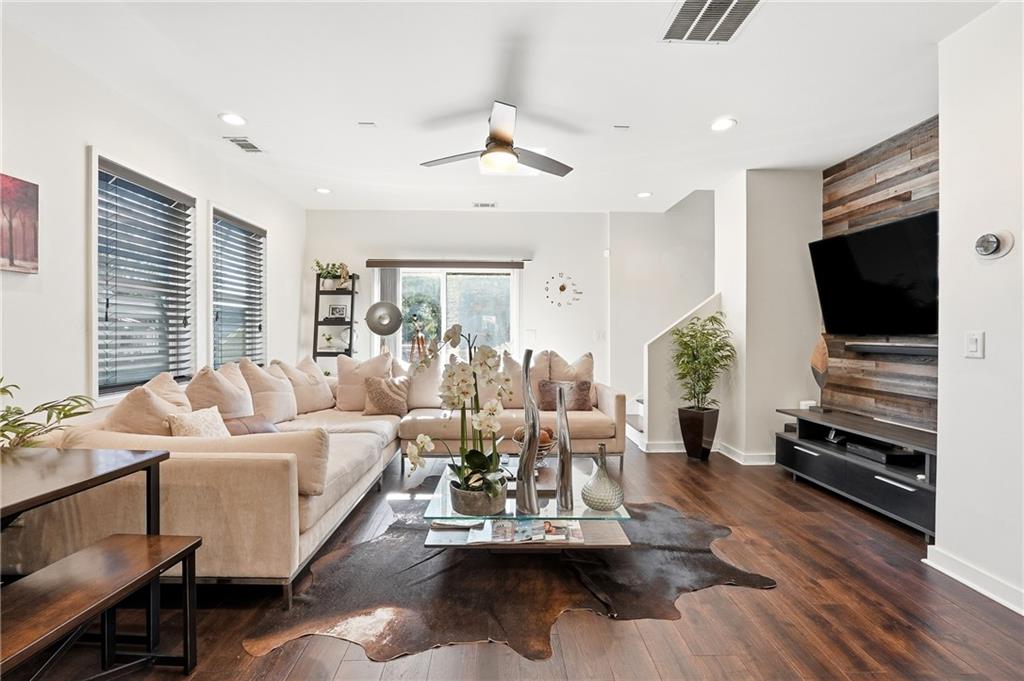 225 Crumley Street Southwest Atlanta, GA 30312 - Photo 10 of 23 a living room with fireplace furniture and a flat screen tv