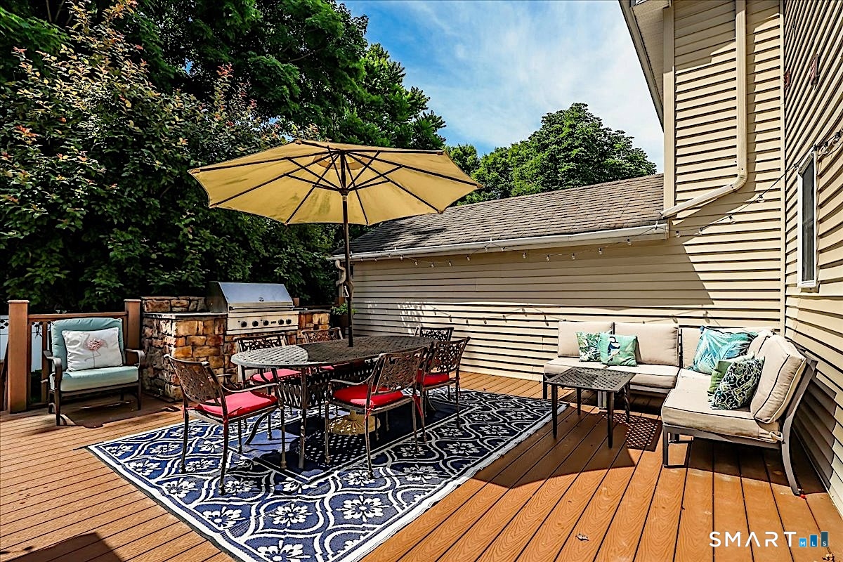 6 Elizabeth Street Newtown, CT 06470 - Photo 23 of 40 Deck Off Living Room Offers Built-in Barbeque and Eating Area