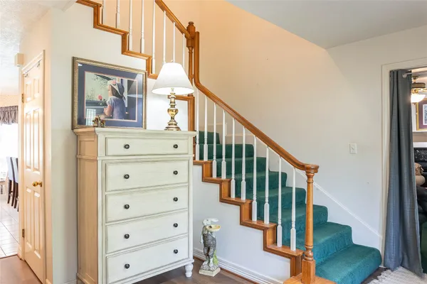 a view of entryway with wooden floor