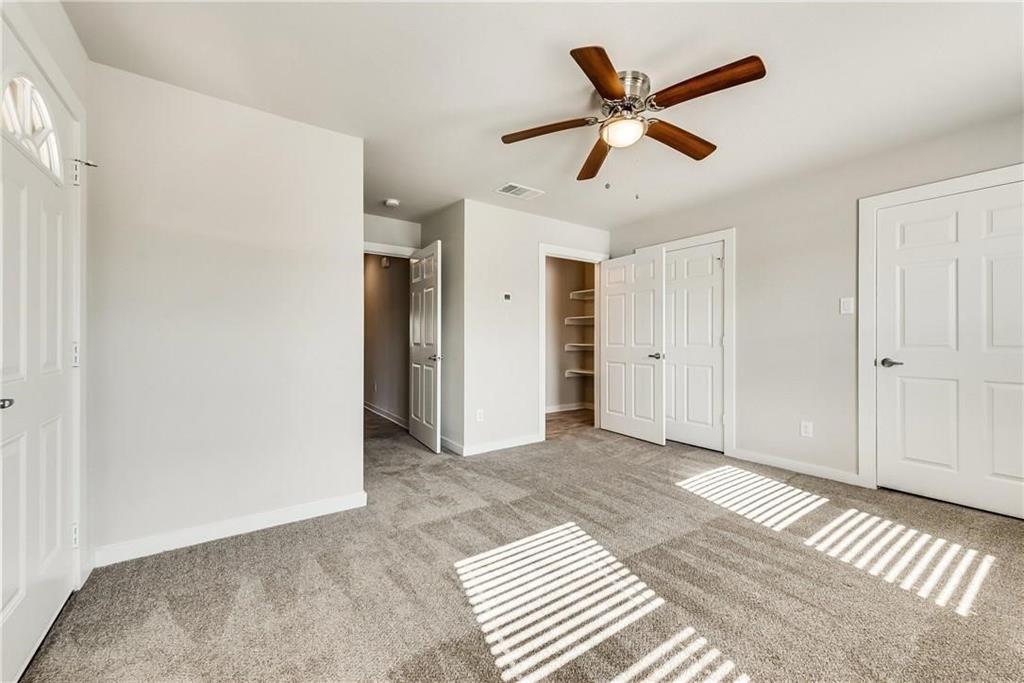 612 North 6th Gunter, TX 75058 - Photo 14 of 17 a view of a livingroom with a ceiling fan and wooden floor