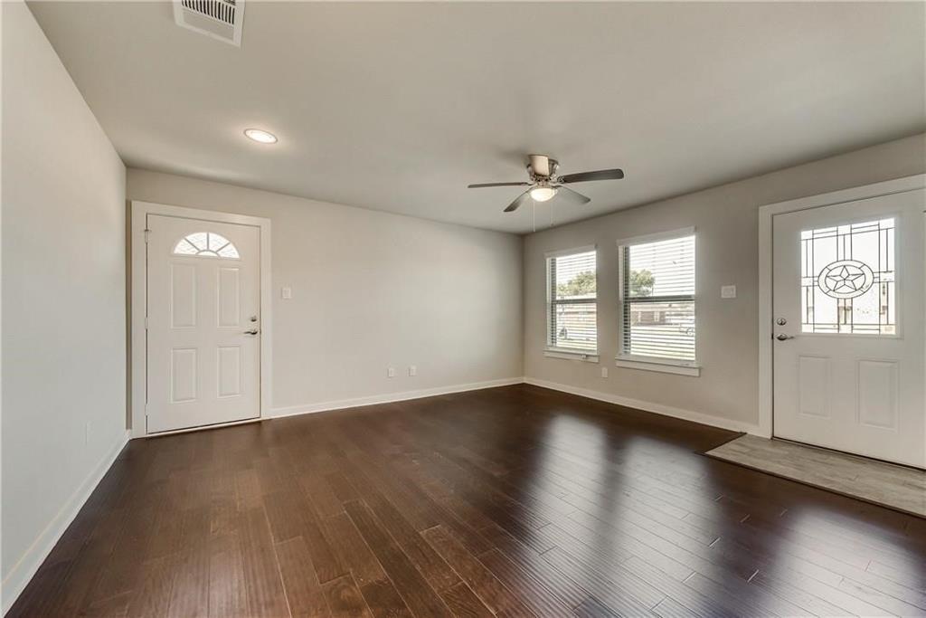 612 North 6th Gunter, TX 75058 - Photo 5 of 17 an empty room with wooden floor and windows