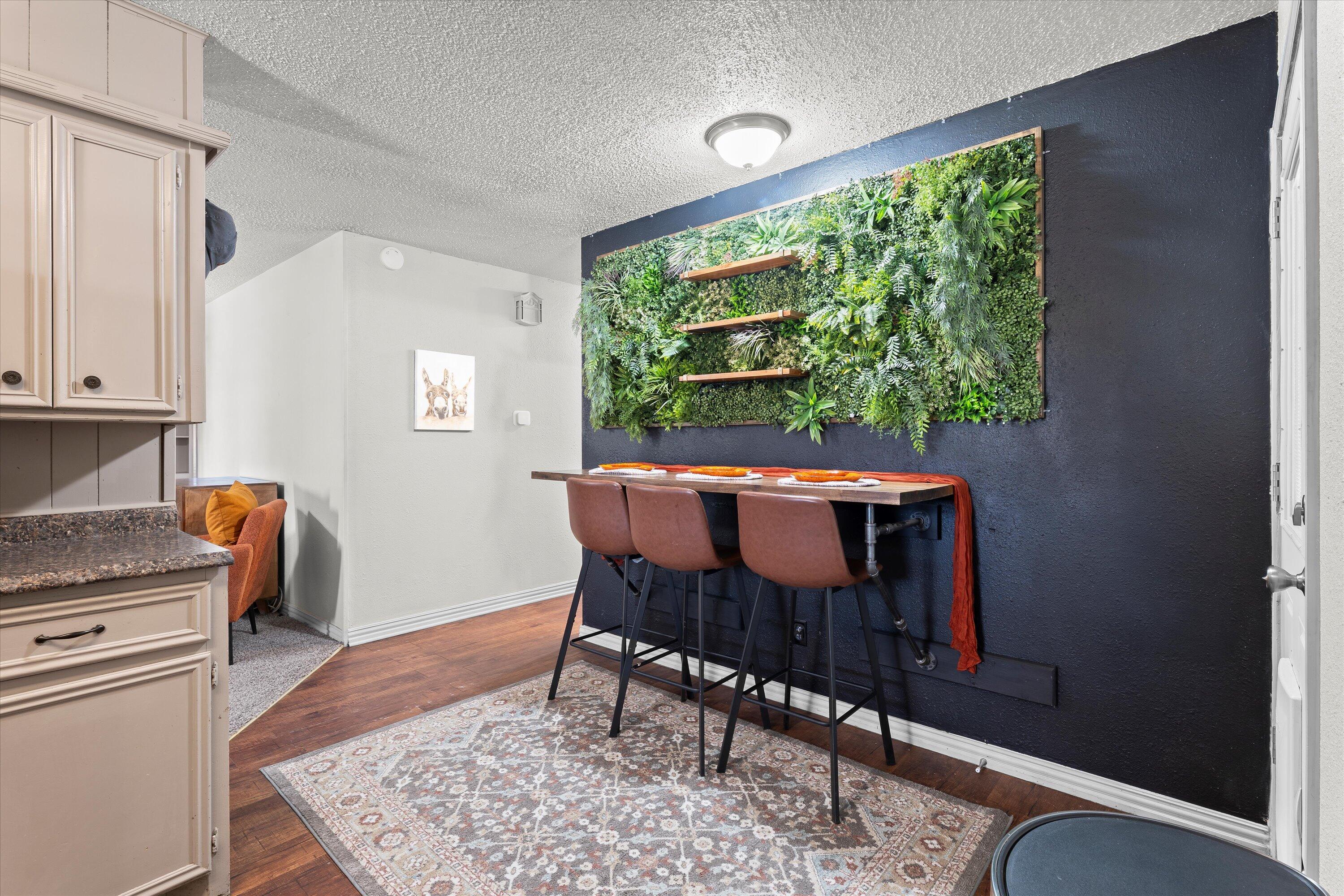 5305 13th Street Lubbock, TX 79416 - Photo 12 of 31 a view of a dining room with furniture window and outside view