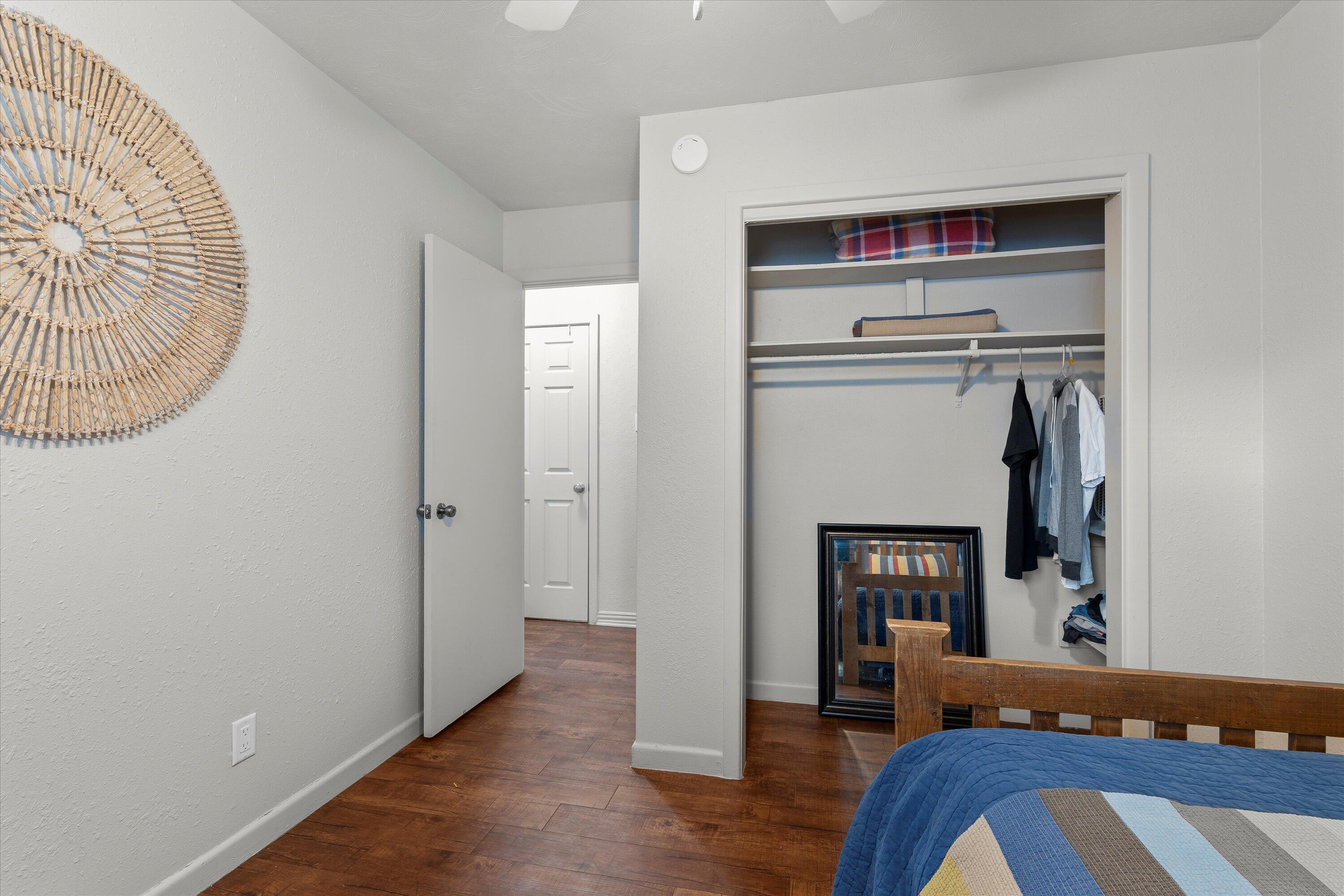5305 13th Street Lubbock, TX 79416 - Photo 17 of 31 a living room with furniture and a wooden floor