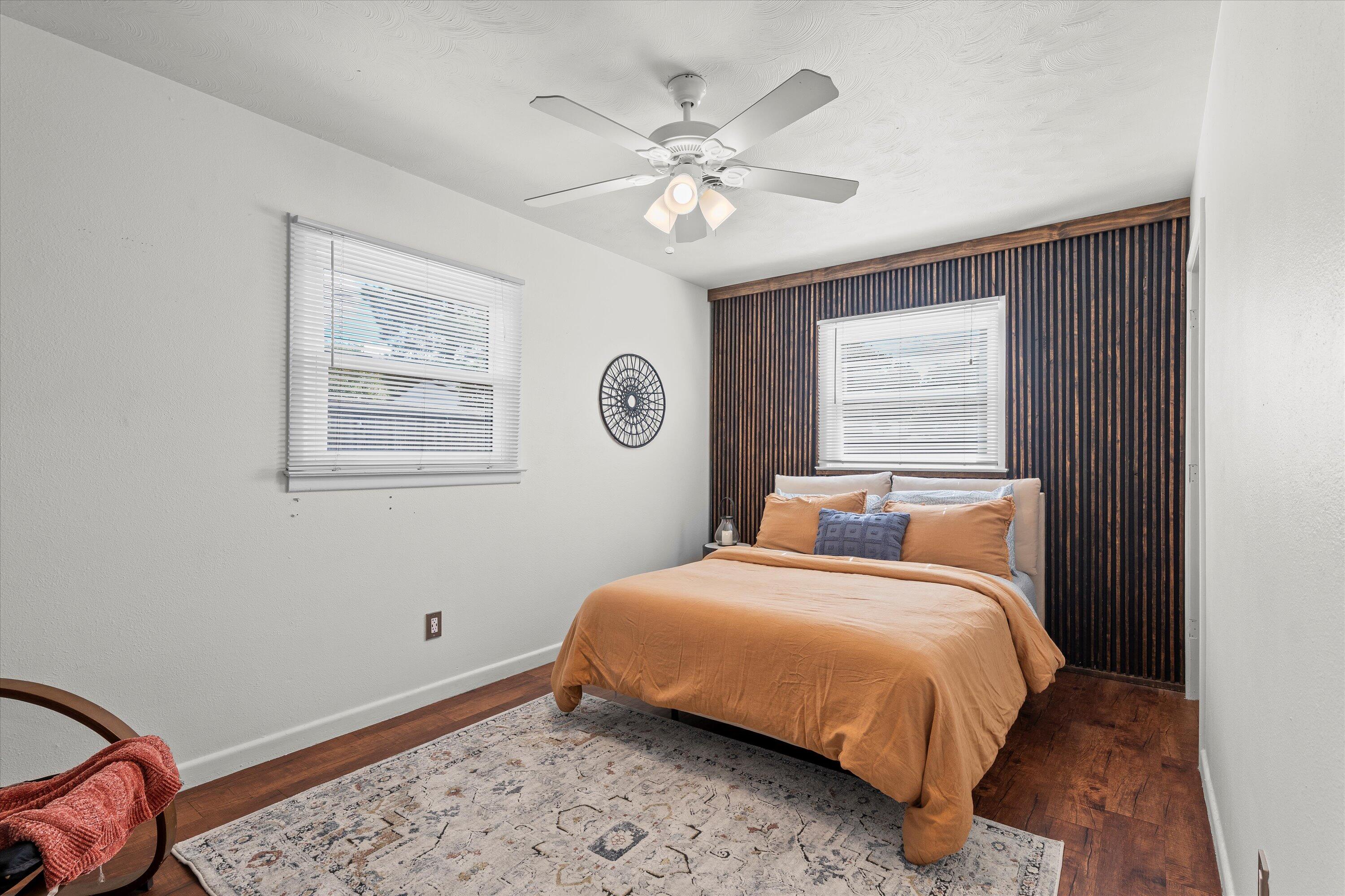 5305 13th Street Lubbock, TX 79416 - Photo 19 of 31 a bedroom with a bed and a window