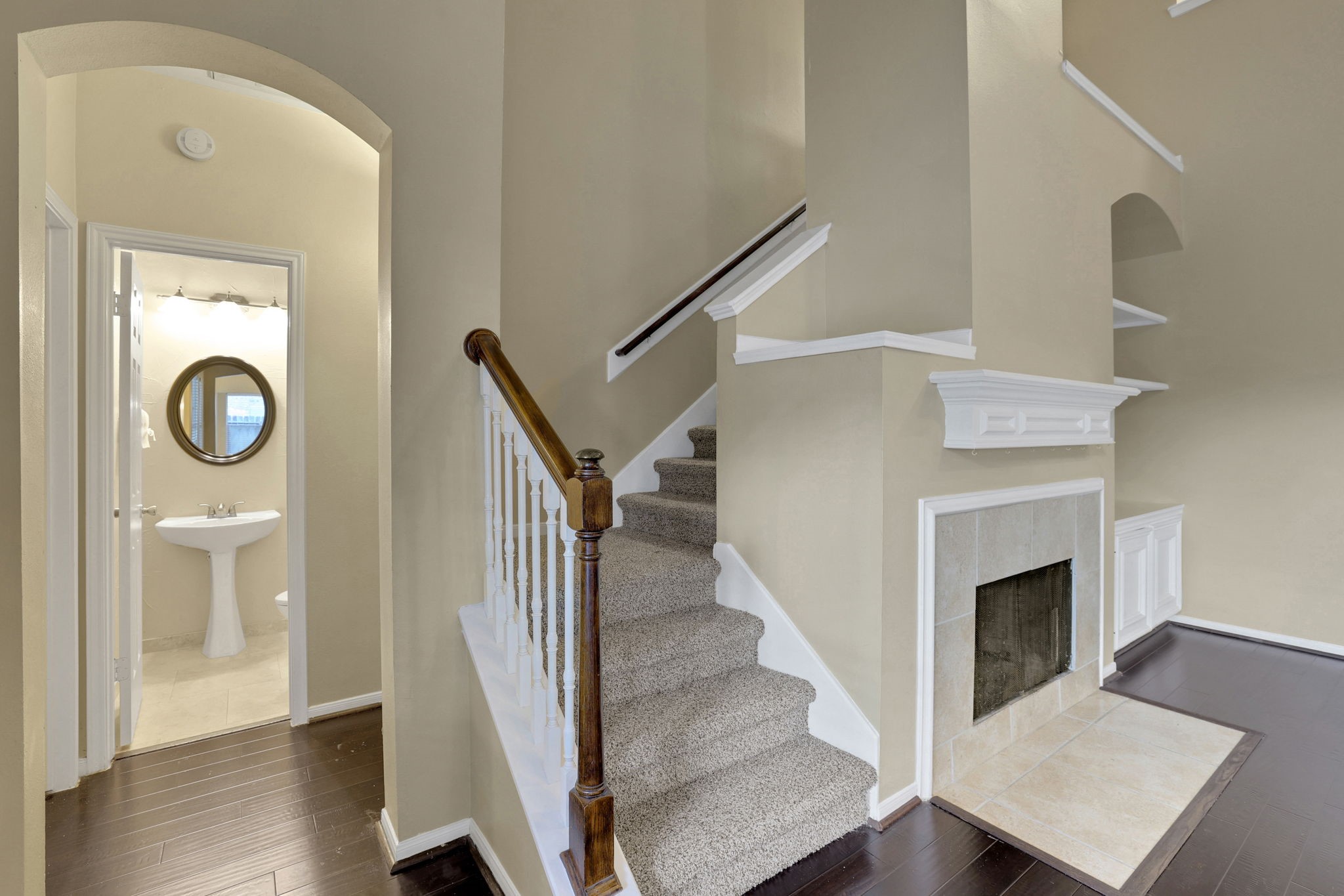 23207 Olive Ridge Court Katy, TX 77494 - Photo 17 of 46 a view of entryway and hall with wooden floor