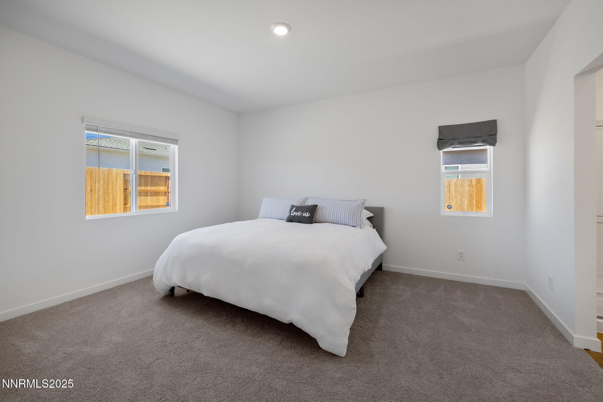 847 Schell Crk Drive Dayton, NV 89403 - Photo 13 of 31 a bedroom with a bed and a window