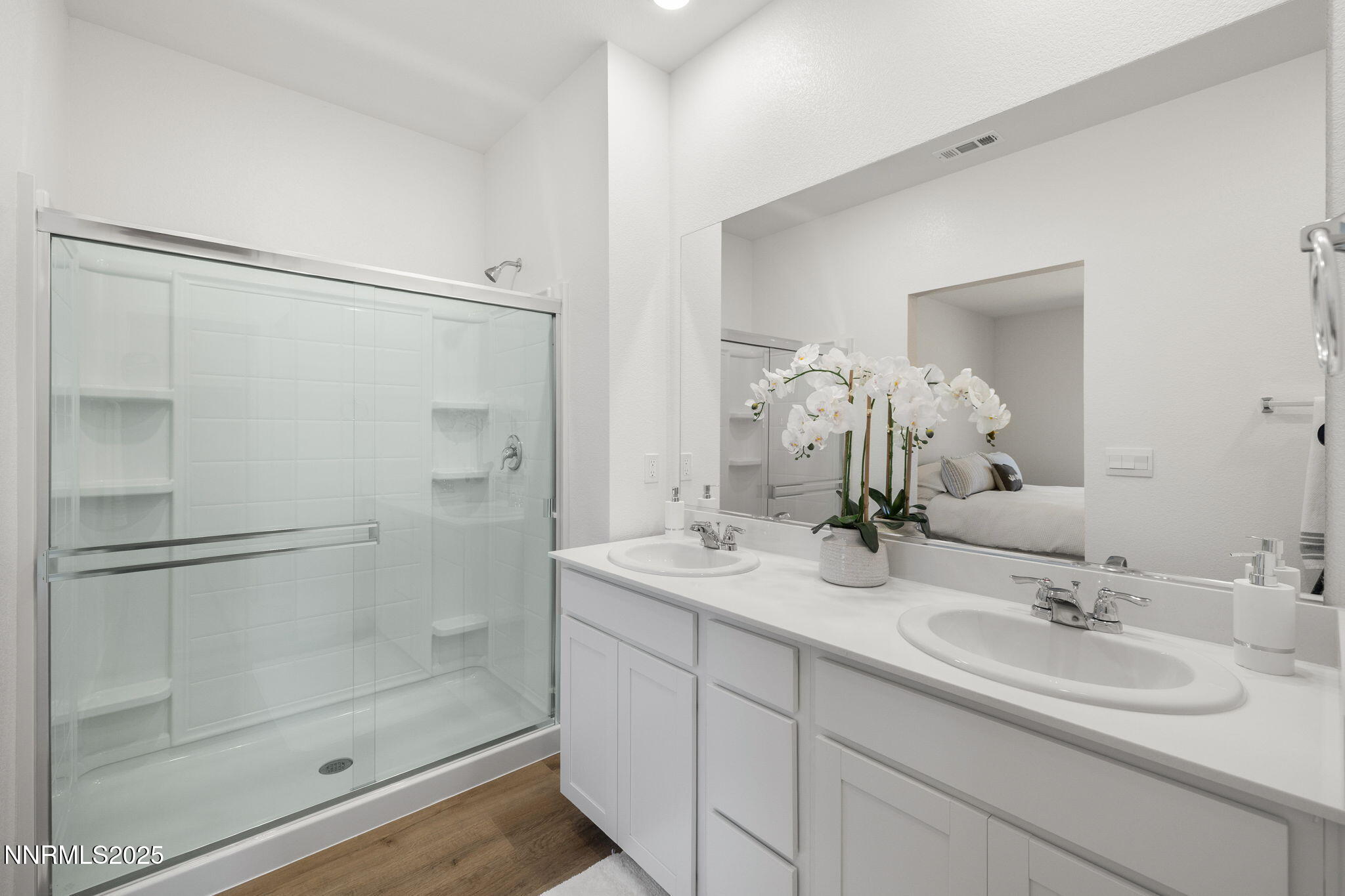 847 Schell Crk Drive Dayton, NV 89403 - Photo 15 of 31 a bathroom with a shower sink vanity and mirror