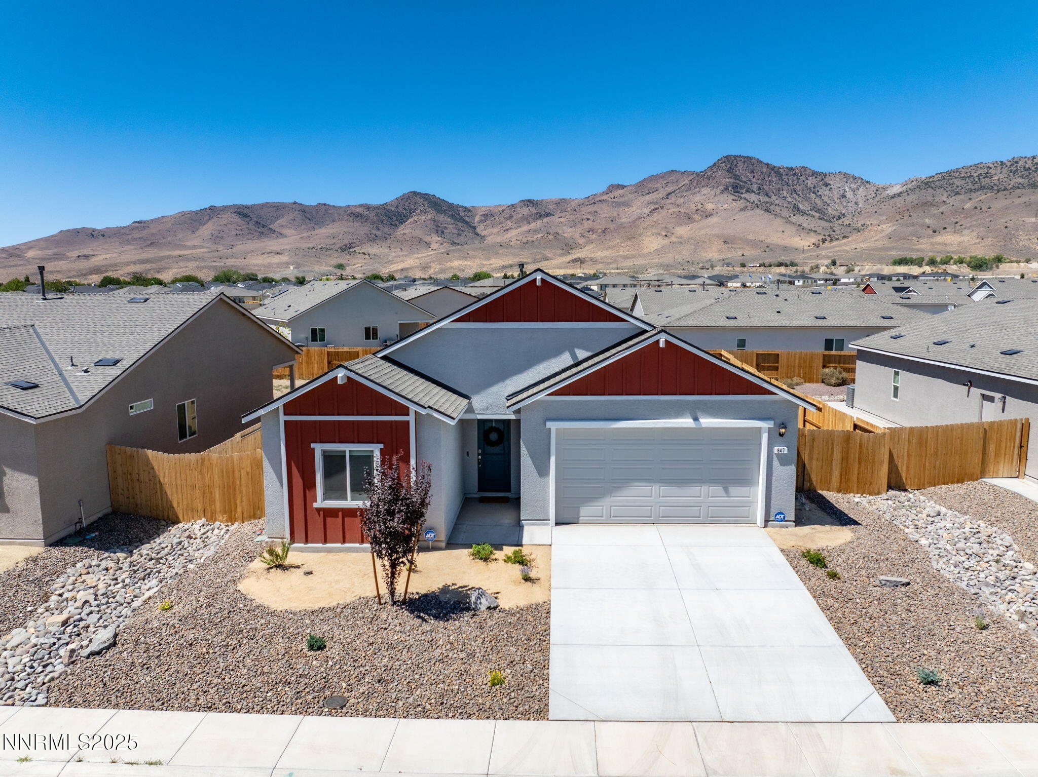 847 Schell Crk Drive Dayton, NV 89403 - Photo 2 of 31 a front view of a house with a yard