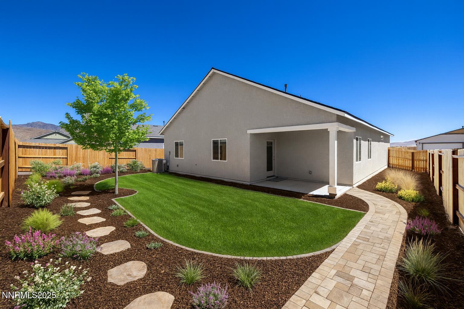 847 Schell Crk Drive Dayton, NV 89403 - Photo 27 of 31 a view of a backyard with a garden