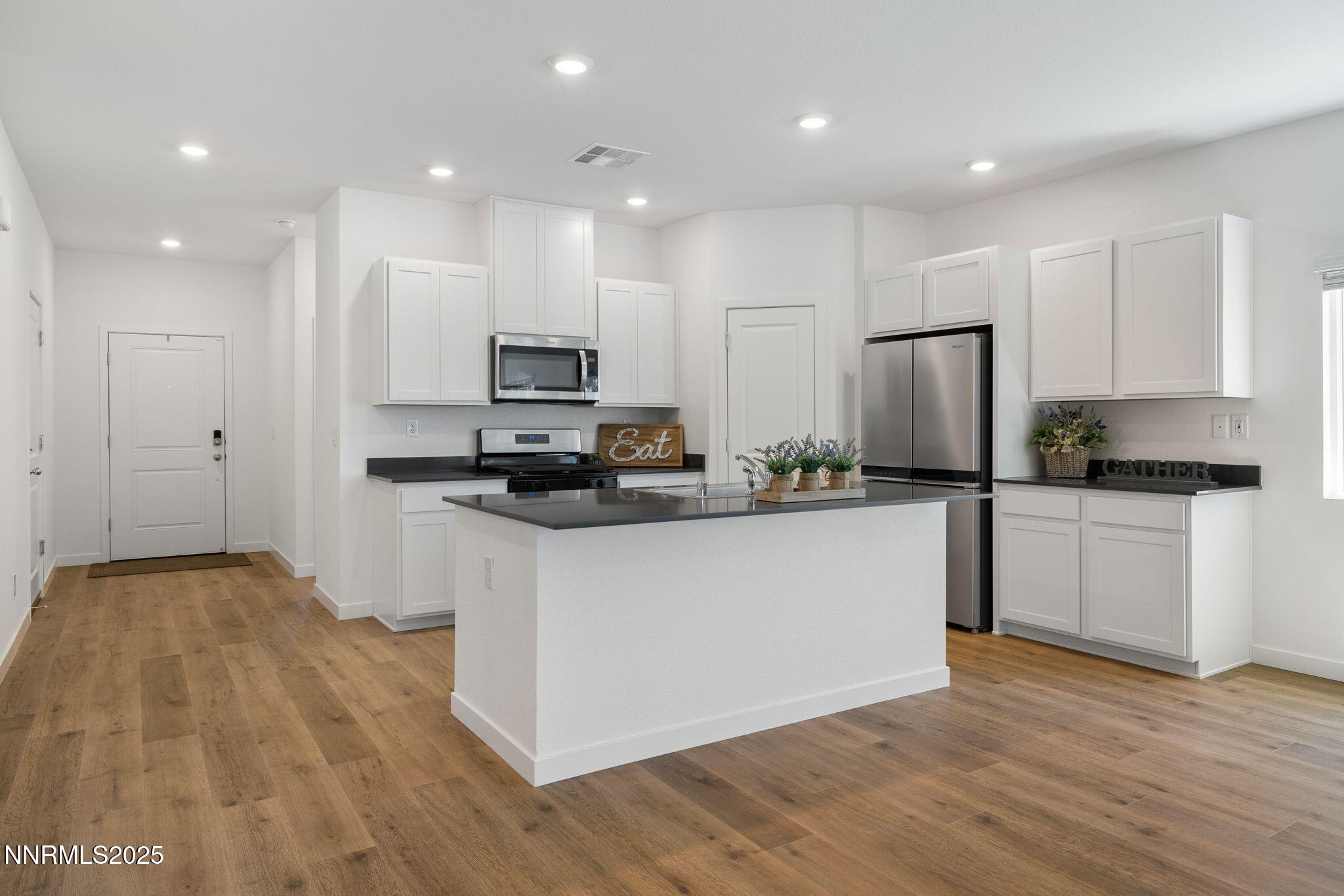 847 Schell Crk Drive Dayton, NV 89403 - Photo 4 of 31 a kitchen with refrigerator and cabinets