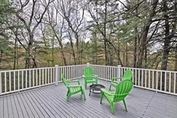 a view of a chair and table on the wooden floor