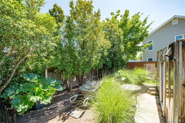 a house view with a backyard space