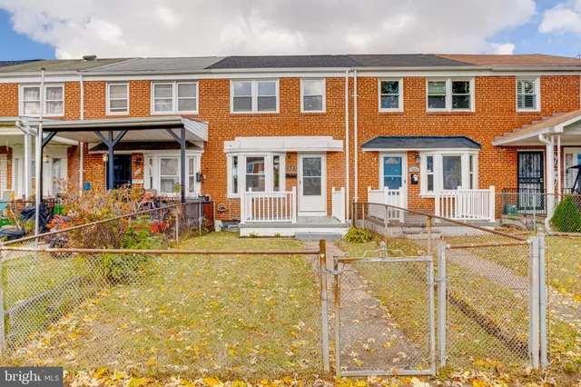 a view of a building with a swimming pool