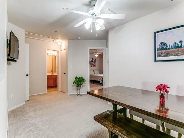 a view of a livingroom with furniture