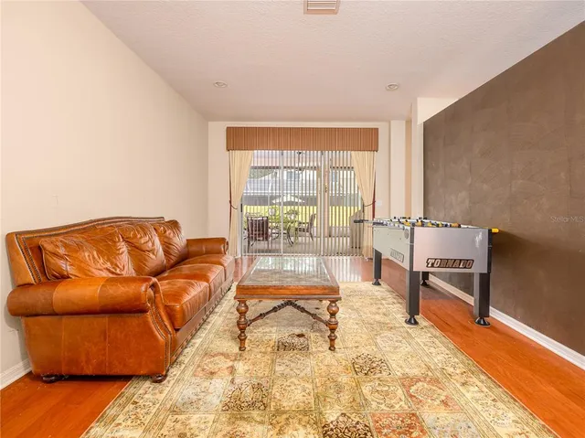 a living room with a couch and a table