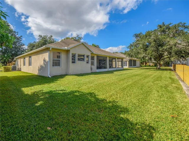 a view of a house with a big yard