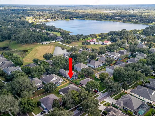 an aerial view of a city with lake view