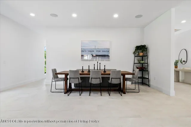 a view of a big room with furniture and window