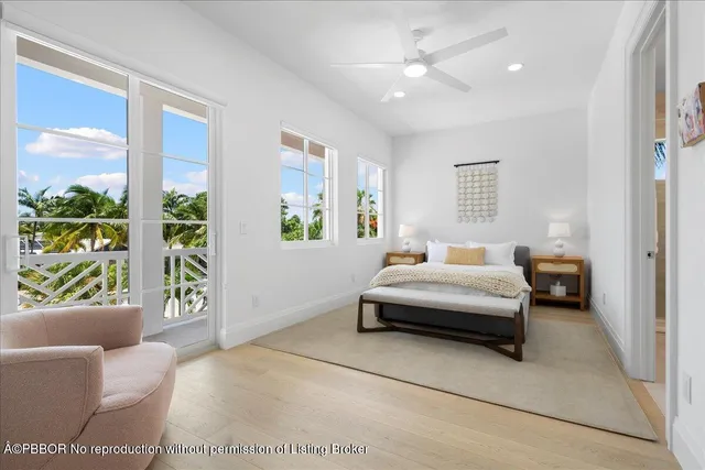 a bedroom with a bed and a couch