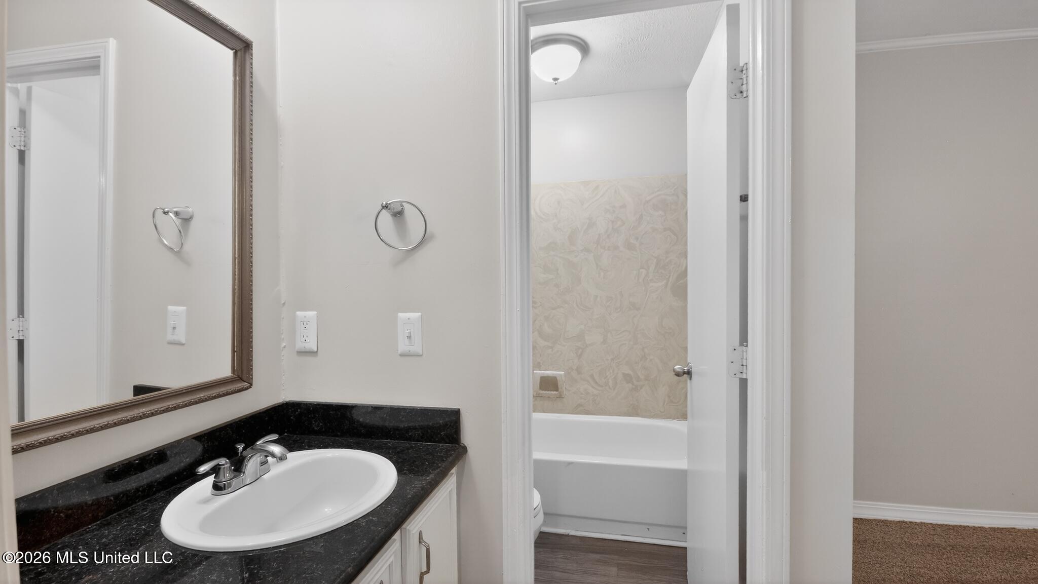 151 Plum Tree Road Brandon, MS 39047 - Photo 14 of 15 15_151_Plum_Tree_Rd-Bathroom-9436