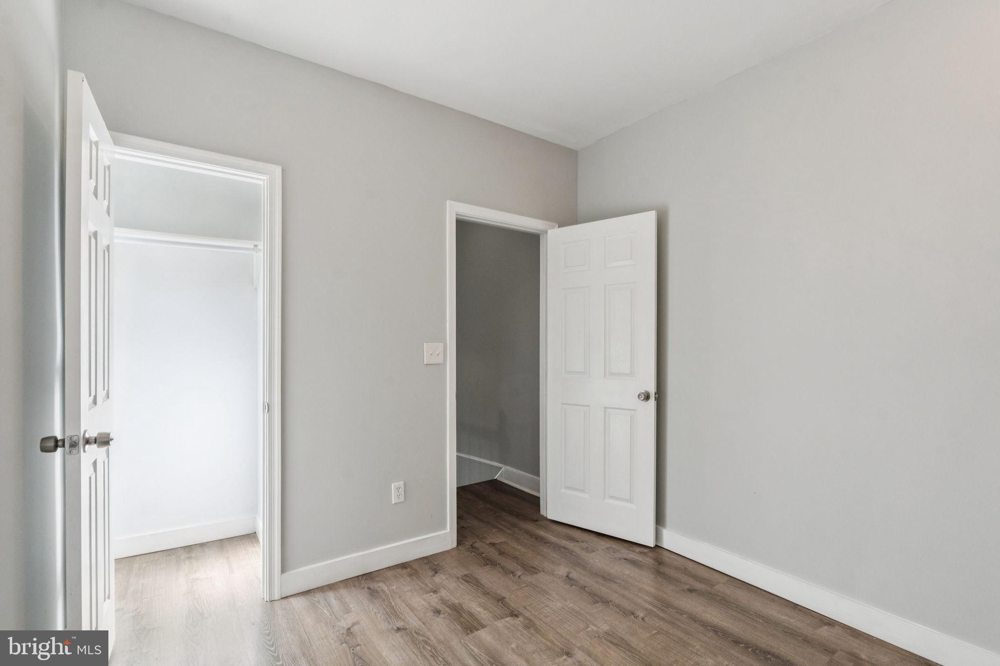17 South 45th Street Philadelphia, PA 19104 - Photo 17 of 26 an empty room with wooden floor & closet