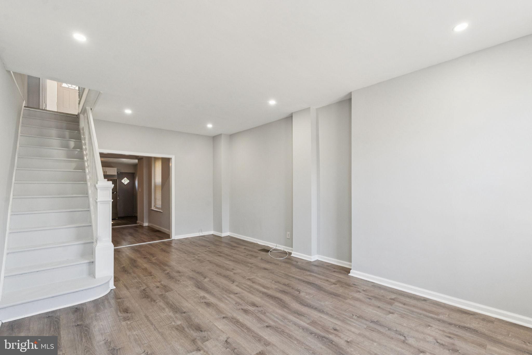 17 South 45th Street Philadelphia, PA 19104 - Photo 2 of 26 a view of a hallway with wooden floor and entryway