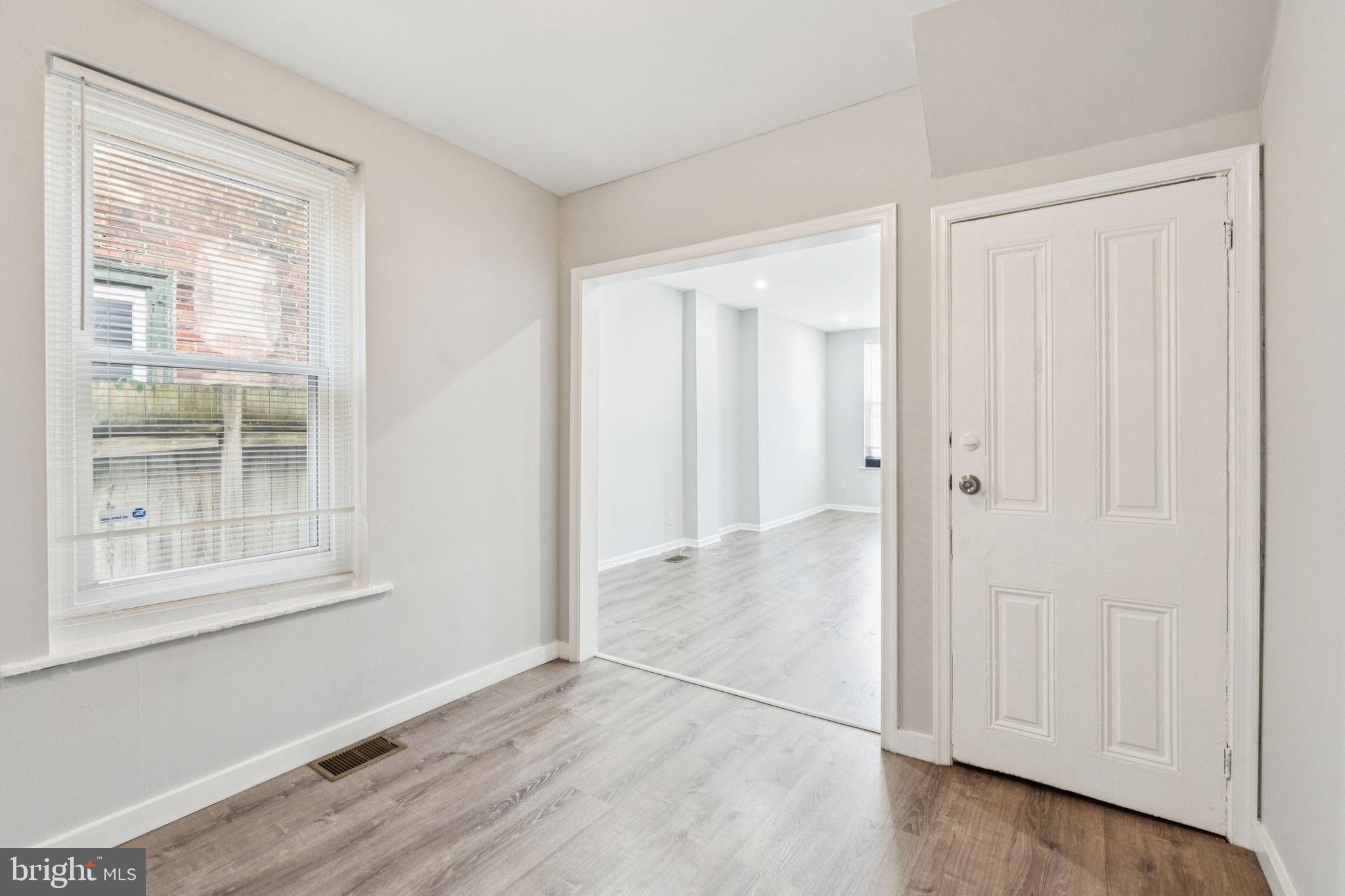 17 South 45th Street Philadelphia, PA 19104 - Photo 5 of 26 an empty room with wooden floor and windows