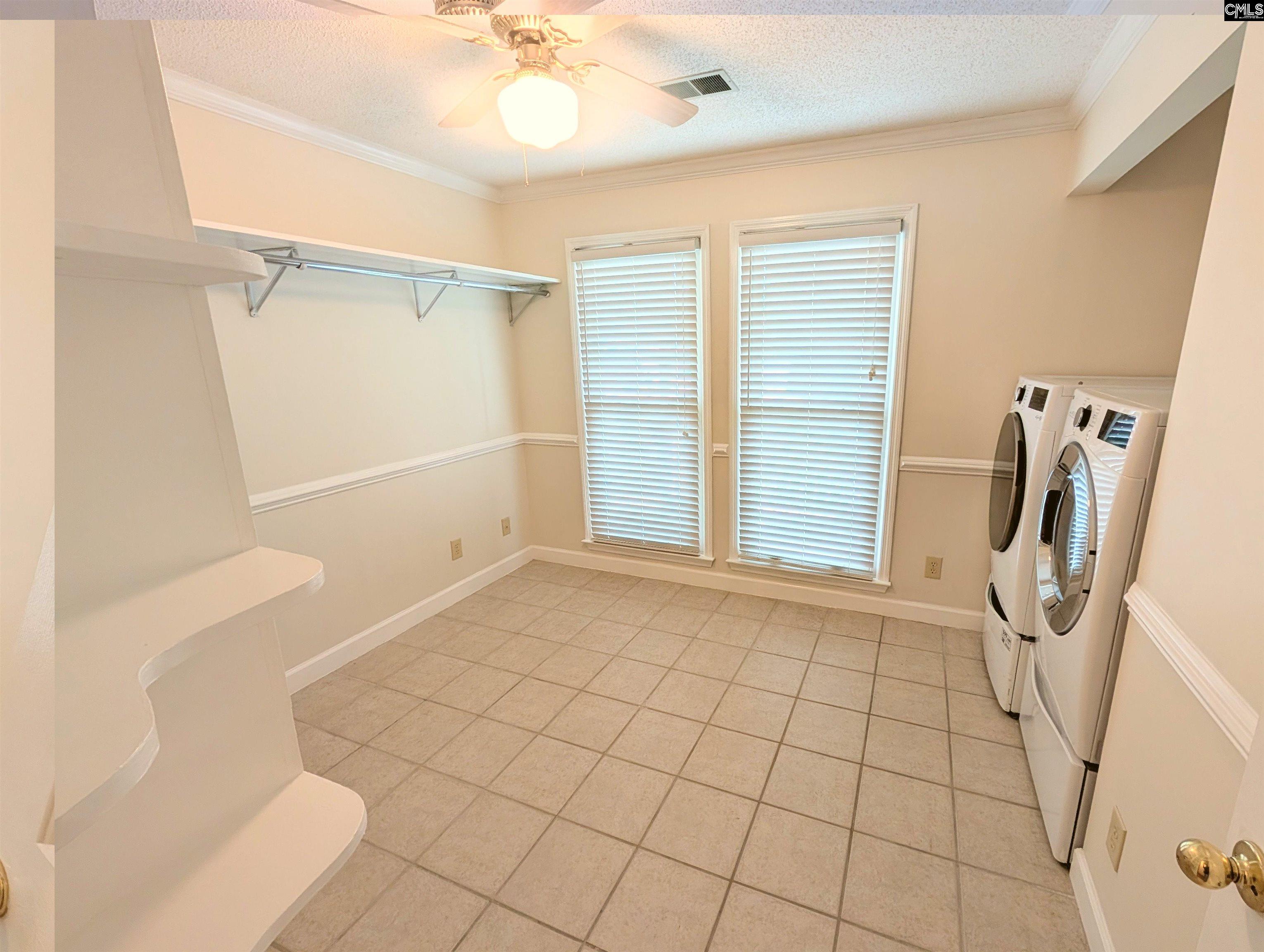 100 Welsh Court Lexington, SC 29073 - Photo 15 of 27 a bathroom with a sink and a shower