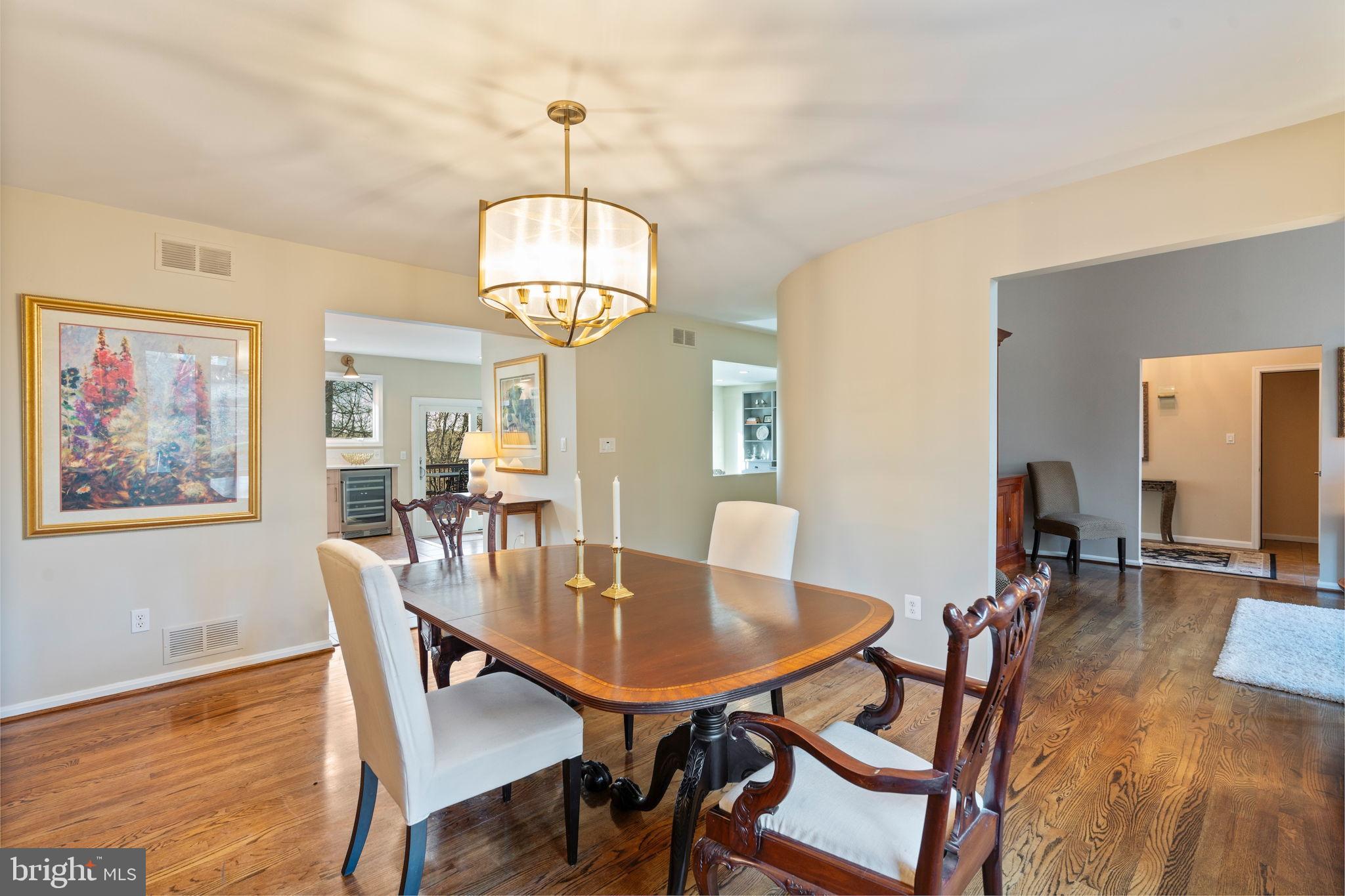2104 Highland Ridge Drive Phoenix, MD 21131 - Photo 13 of 88 Elegant dining room with warm wood tones.